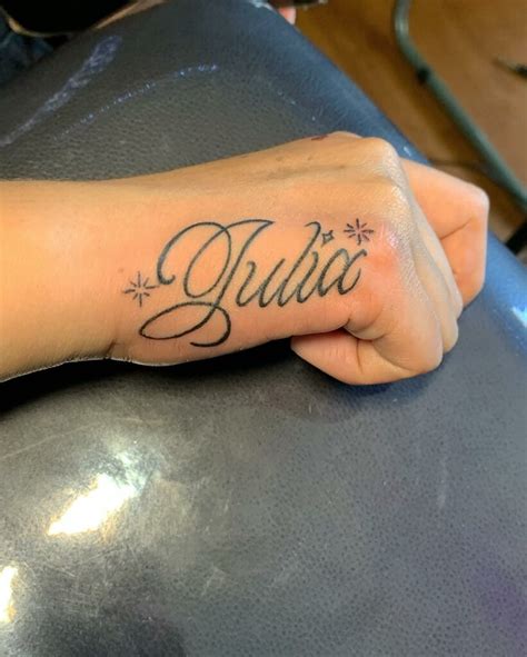 tattoo in hand name|More.